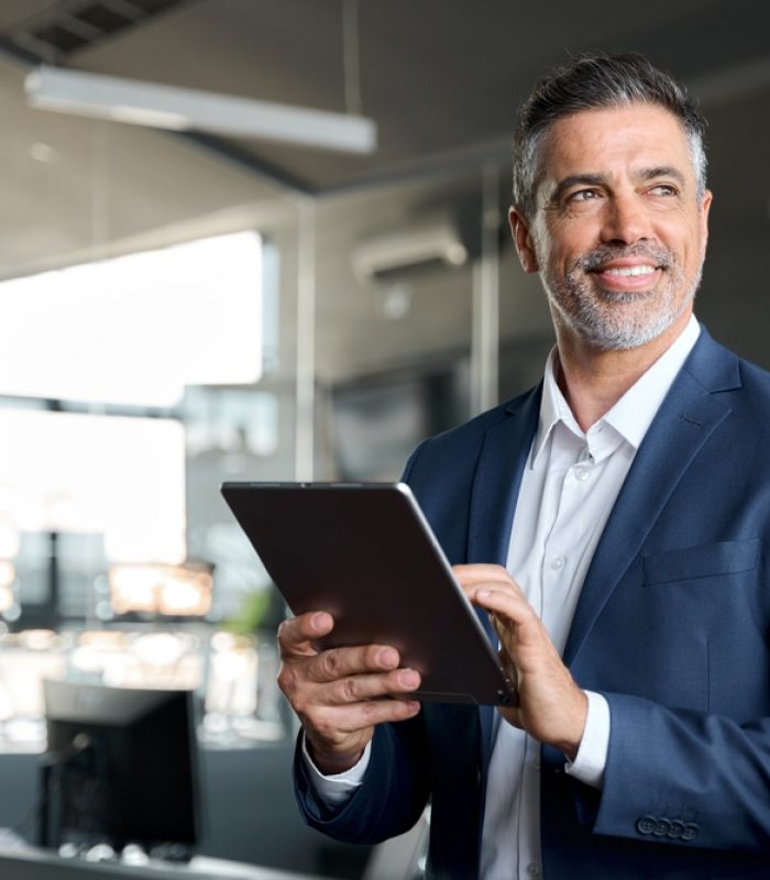 Happy,Middle,Aged,Business,Man,Ceo,Wearing,Suit,Standing,In